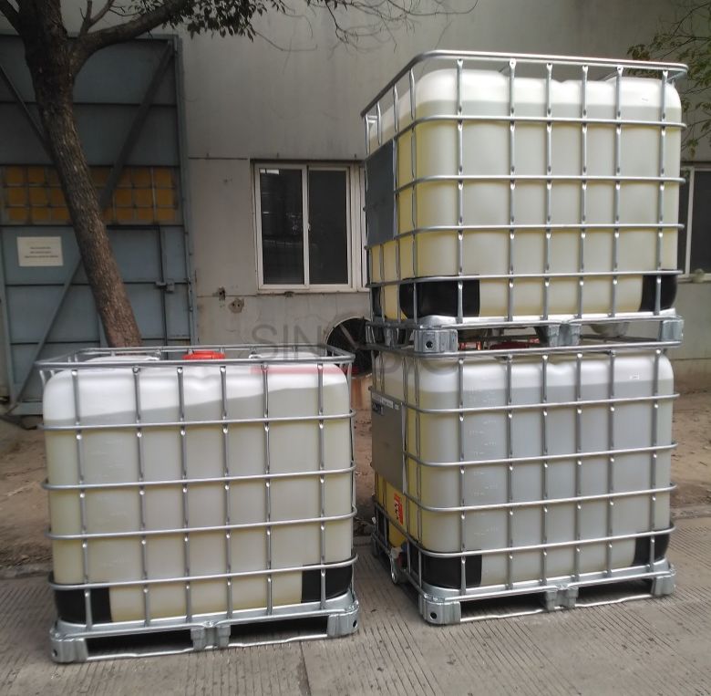 2-Butoxyethanol IBC Containers at Factory Yard 2‑Butoxyethanol IBC intermediate bulk containers parked outside factory warehouse